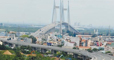 Phu My Bridge connecting District 2 with District 7 in HCMC (Photo: SGGP) Phu My Bridge connecting District 2 with District 7 in HCMC (Photo: SGGP)